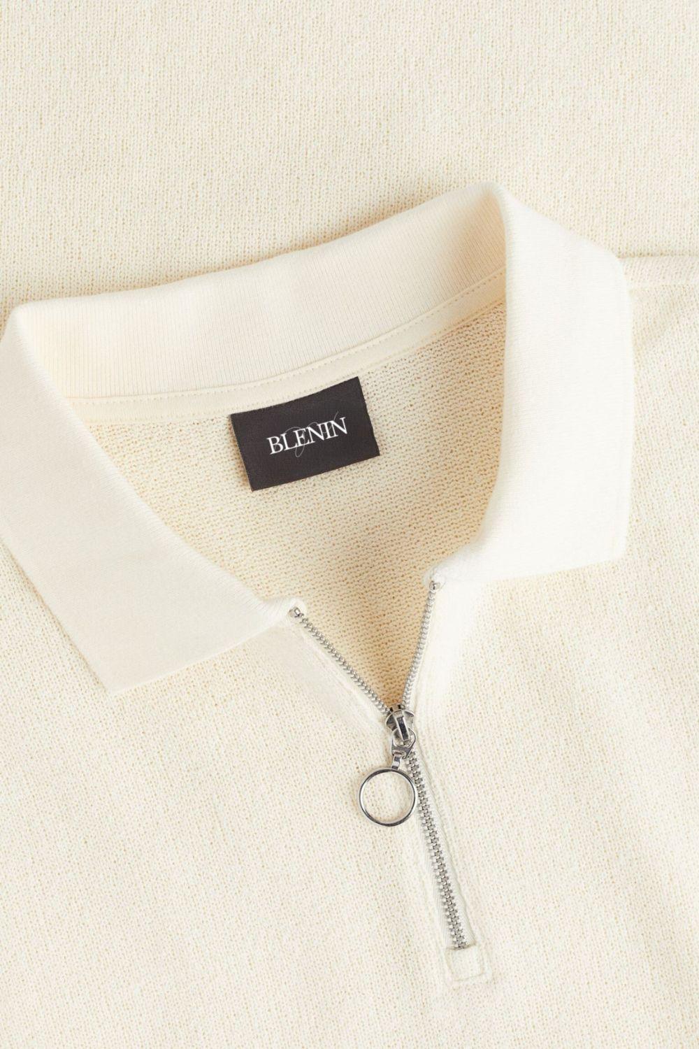Polo moderna in maglia con zip