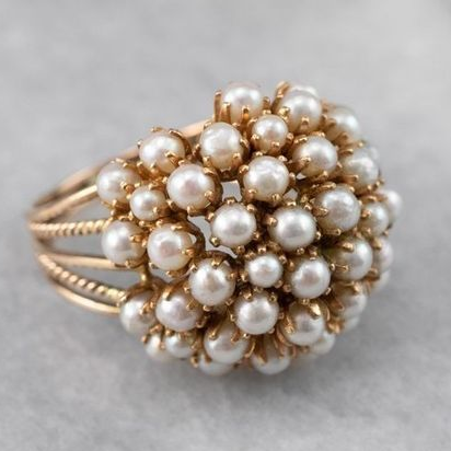 ANELLO CON PERLE INCASTONATE