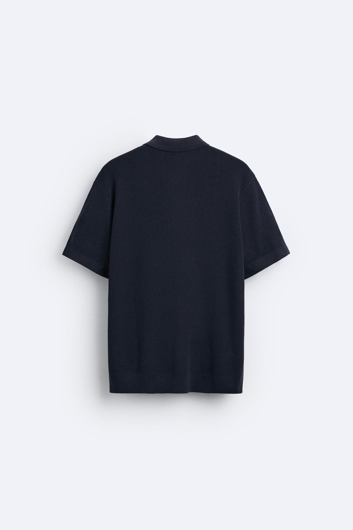 Elegante polo in maglia con zip