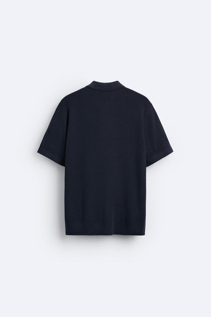 Elegante polo in maglia con zip