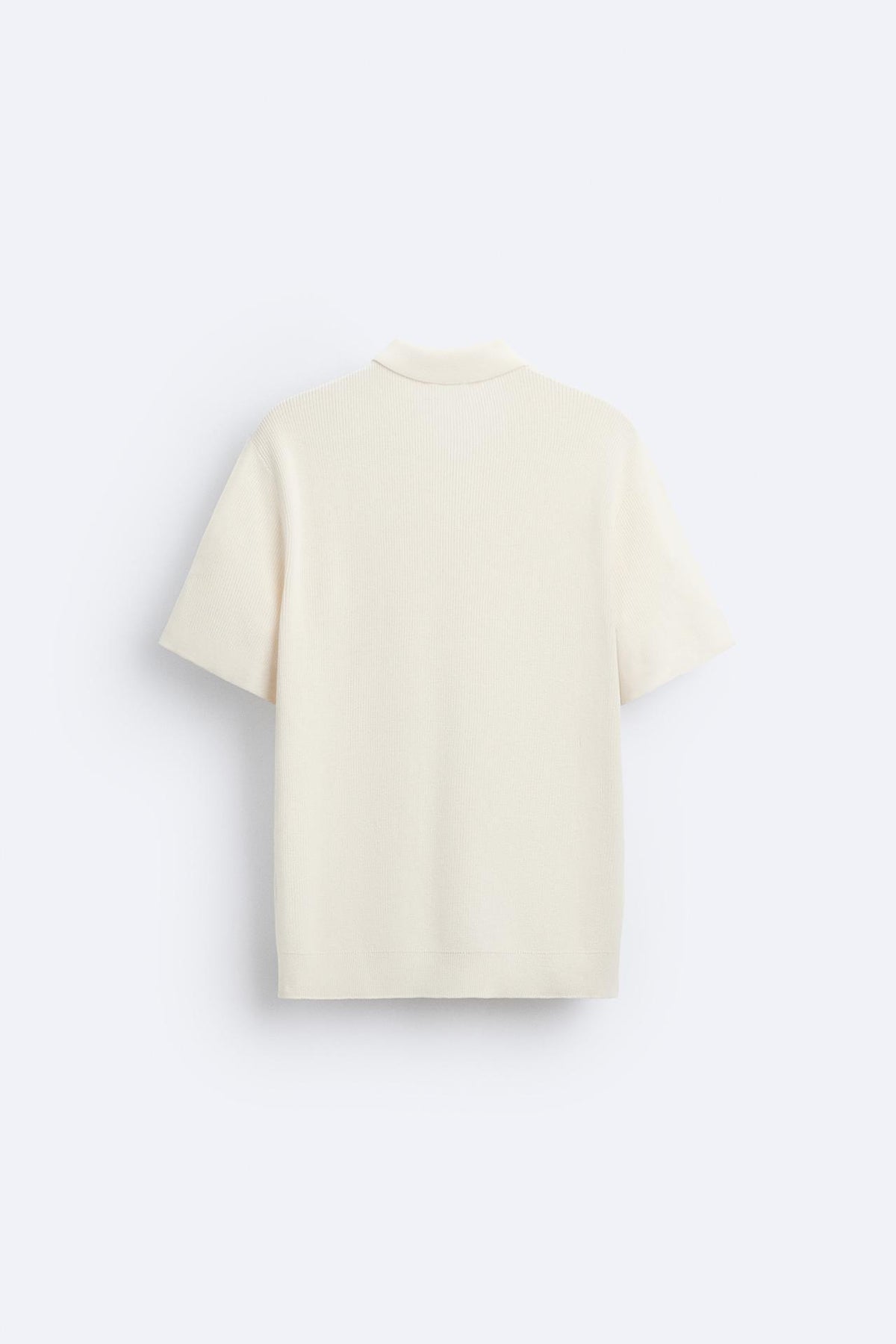 Elegante polo in maglia con zip