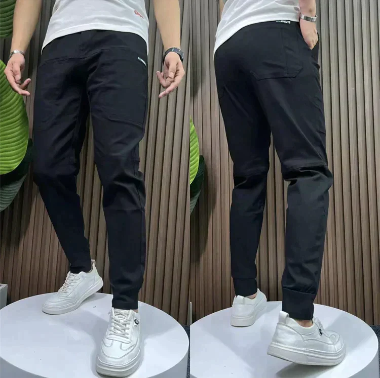 PANTALONI CARGO MULTITASCHE