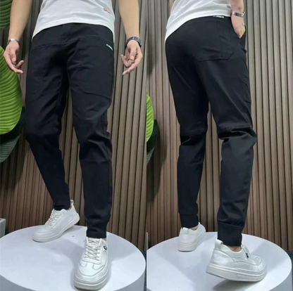 PANTALONI CARGO MULTITASCHE