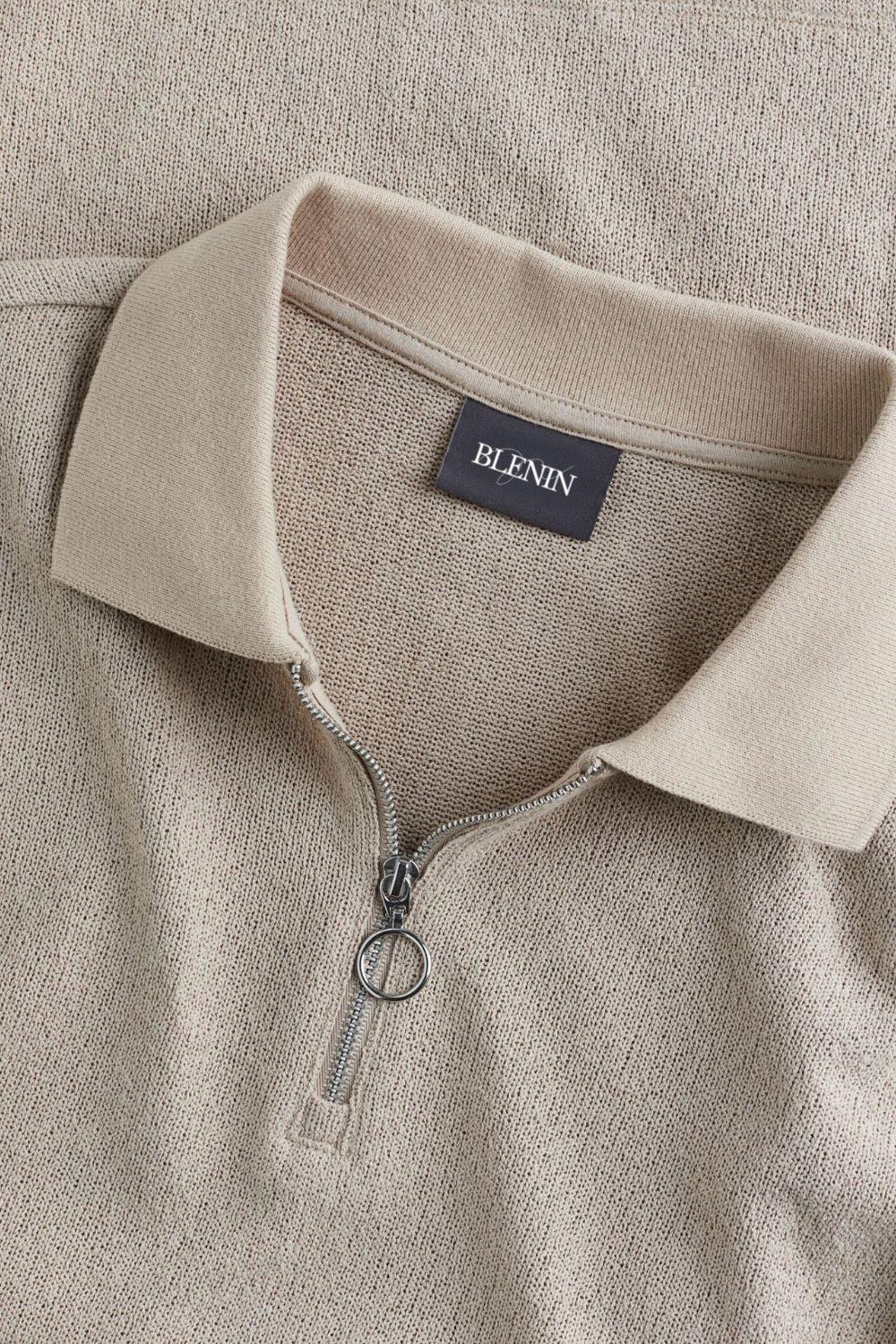 Polo moderna in maglia con zip