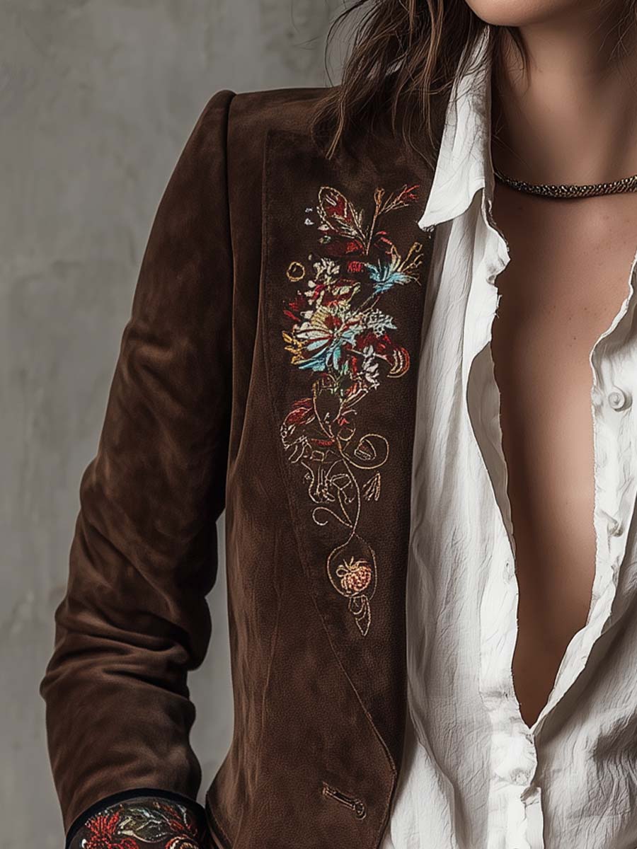Giacca vintage in pelle marrone con elementi ricamati