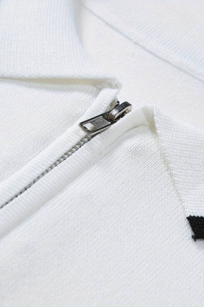 Polo classica con zip e dettagli a contrasto