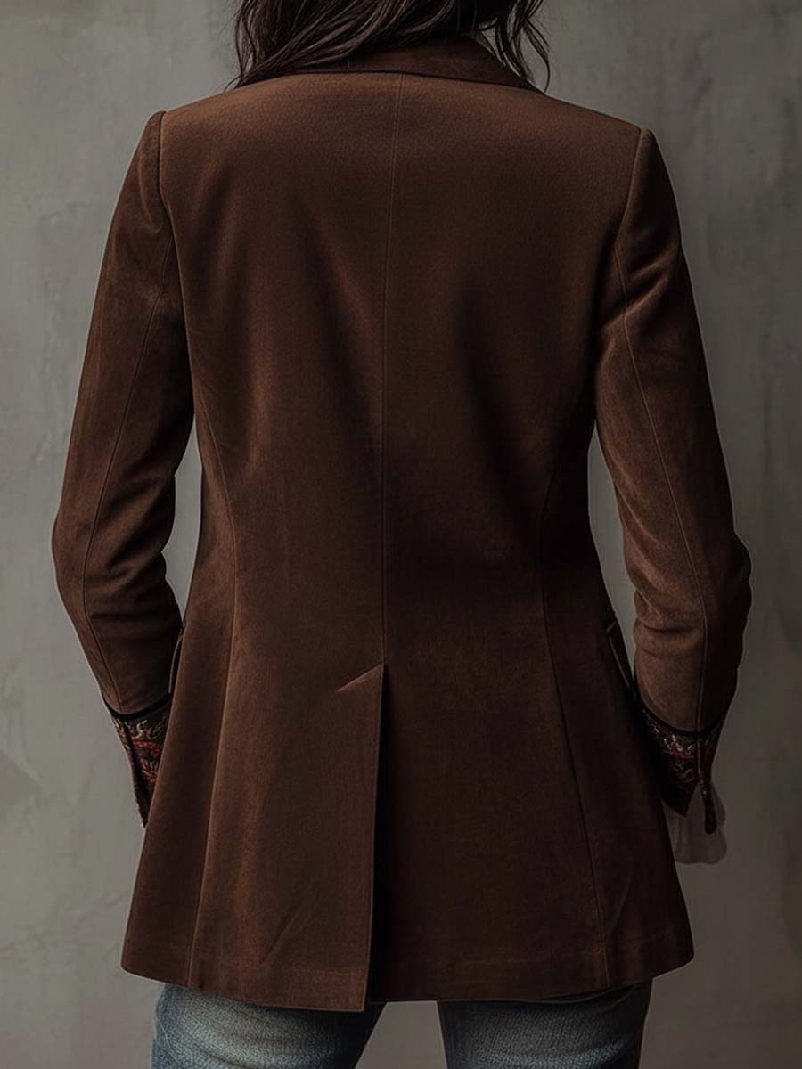 Giacca vintage in pelle marrone con elementi ricamati