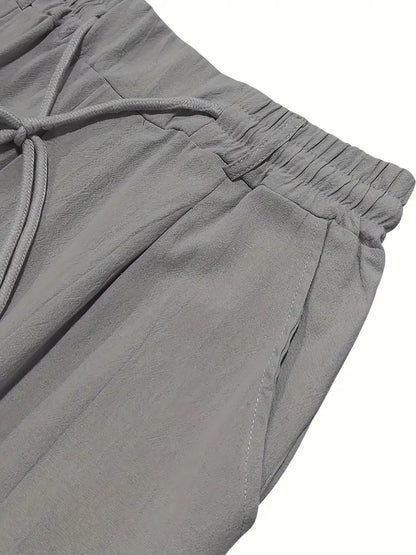 PANTALONI LARGHI IN LINO CON COULISSE