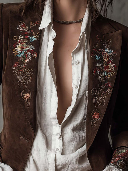 Giacca vintage in pelle marrone con elementi ricamati