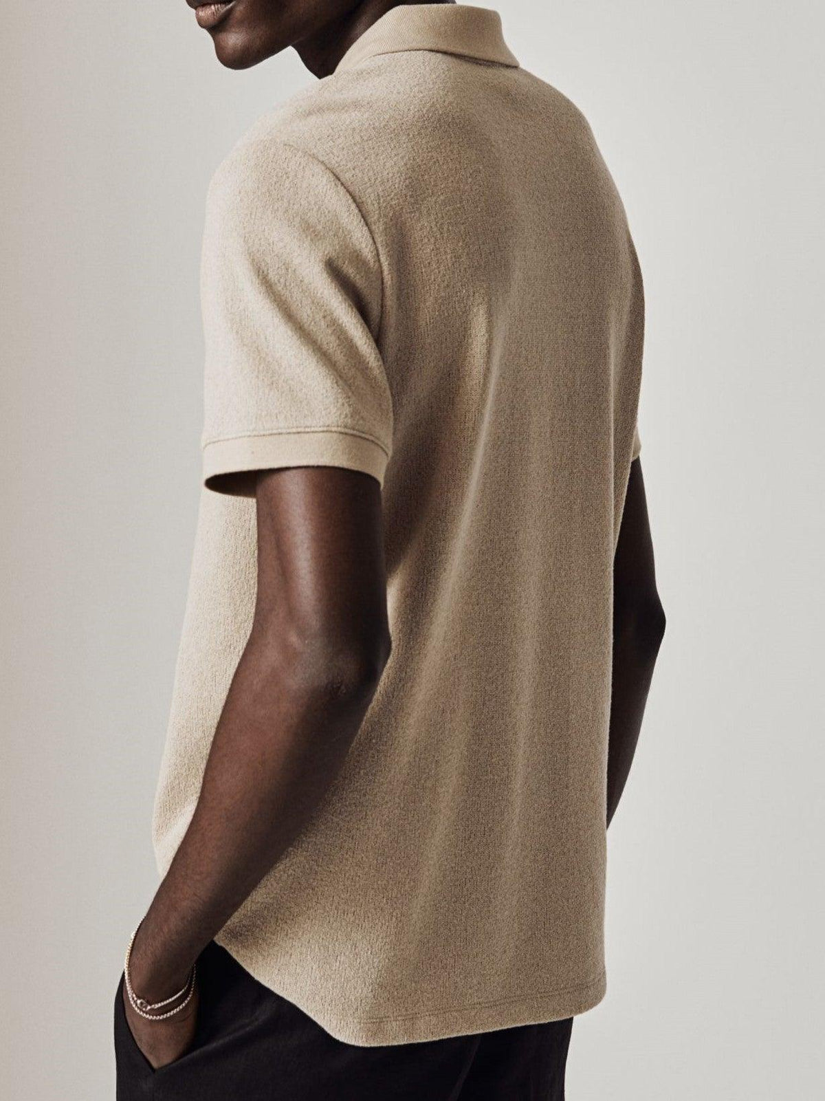 Polo moderna in maglia con zip