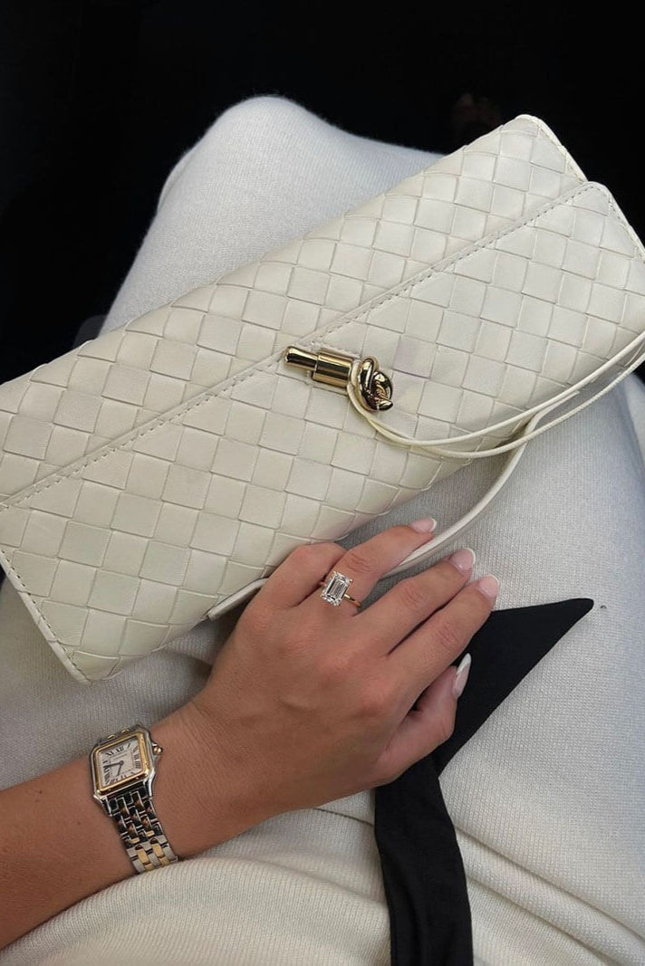 Pochette Melanie con fiocchi dorati