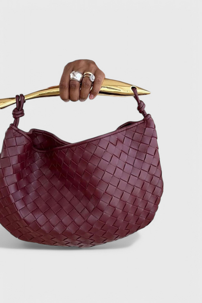 Borsa Gerda intrecciata con manico dorato