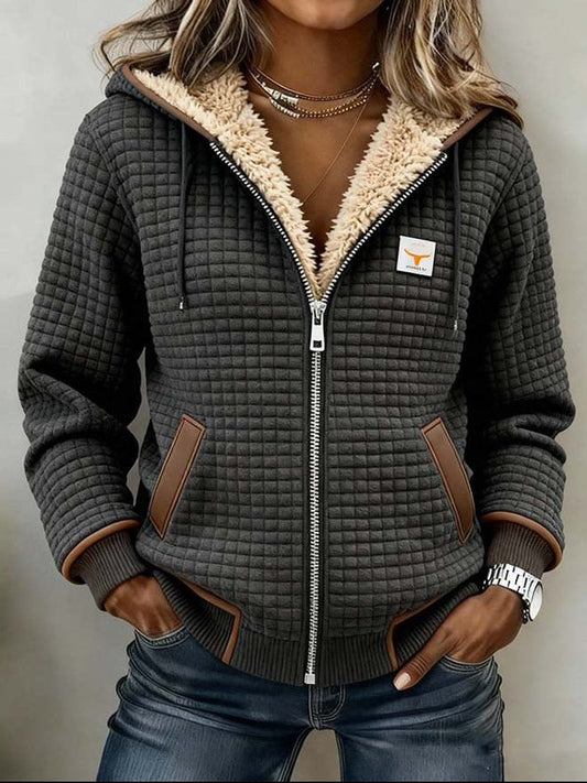 Sandra | Giacca trapuntata con zip e cappuccio, foderata in sherpa