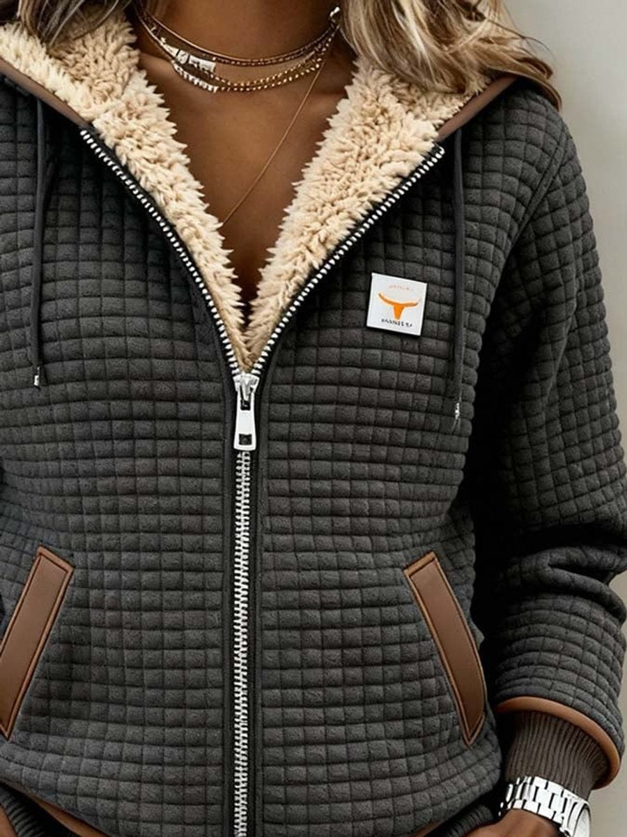 Sandra | Giacca trapuntata con zip e cappuccio, foderata in sherpa