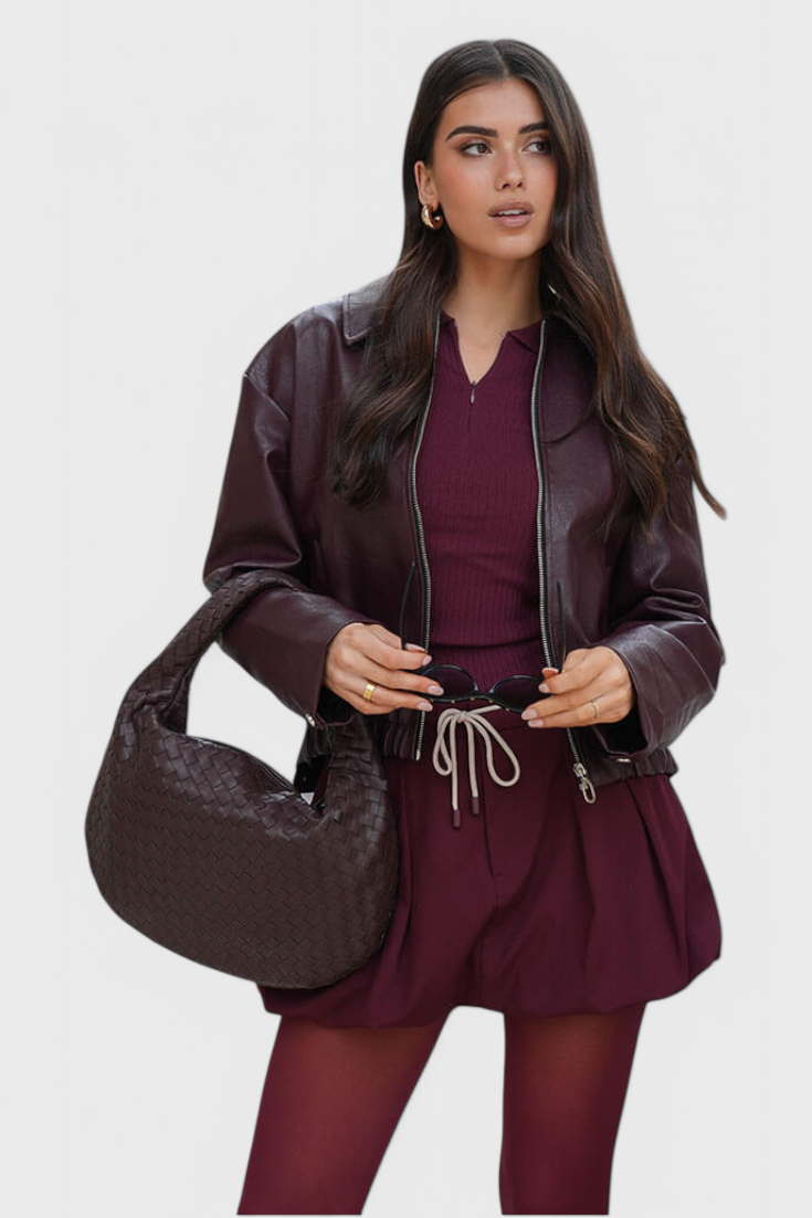 Borsa a mano media intrecciata color lilla con dettagli a nodo